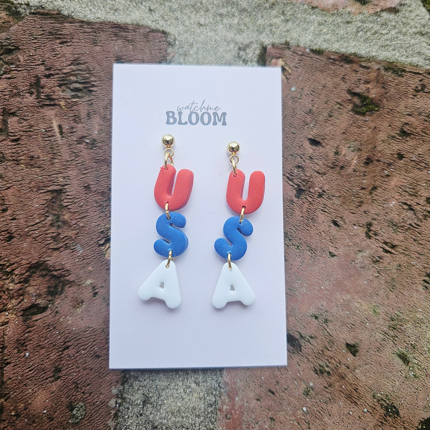 Clay USA dangle earrings on studs