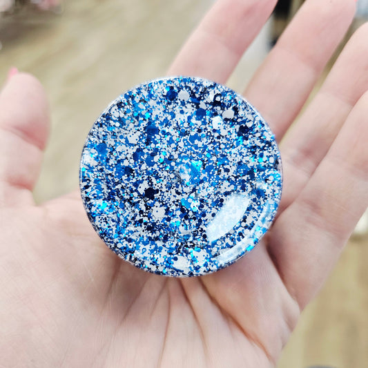 Blue and white face and body glitter Mandeville, Louisiana high school