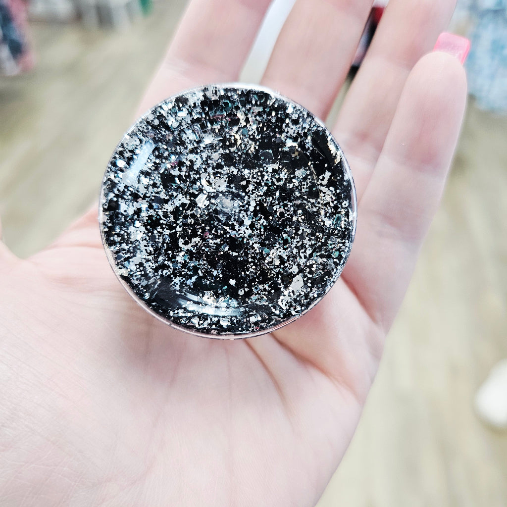 Silver, black and white face and body glitter Lakeshore High, Mandeville, Louisiana