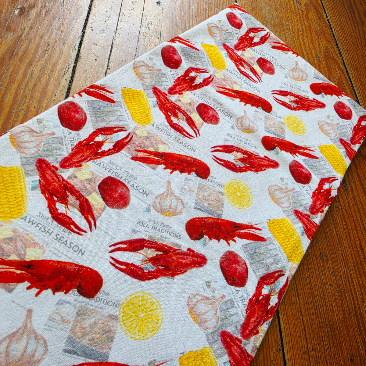 Newspaper Crawfish Tea Towel