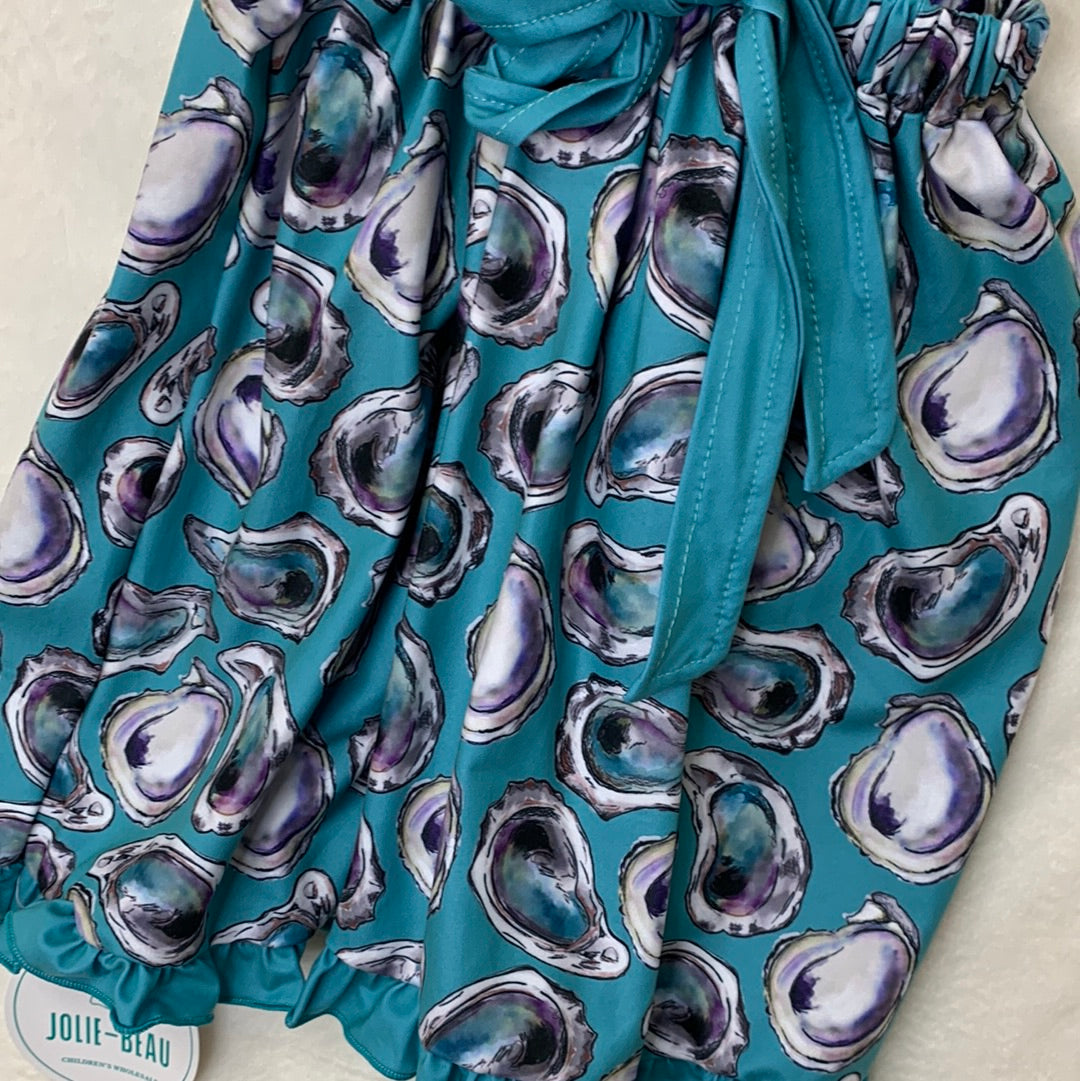 Oyster Apron Style Girl's Dress with Teal Background