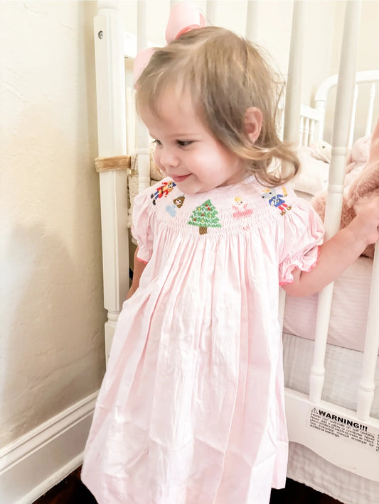 Pink smocked nutcracker dress