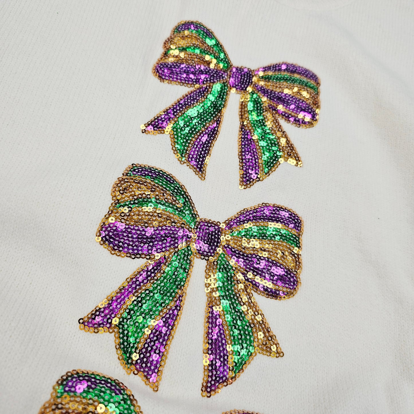 Sequin Mardi Gras Bow Cream Sweater